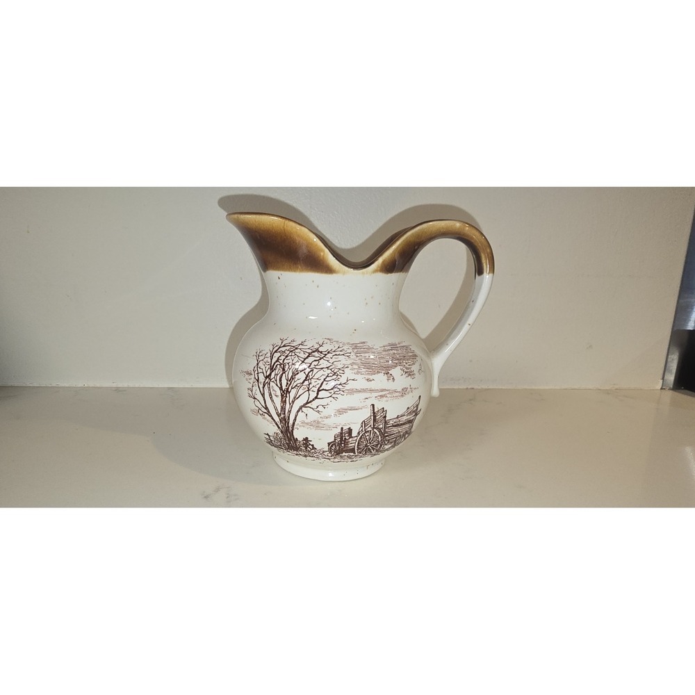 vintage 1980 Enesco Sky & Plains creamer pitcher featuring a brown wagon...